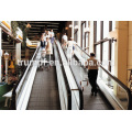 Moving sidewalk escalator in mall